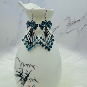 Chandelier Bow Rhinestone Statement Earrings in Blue